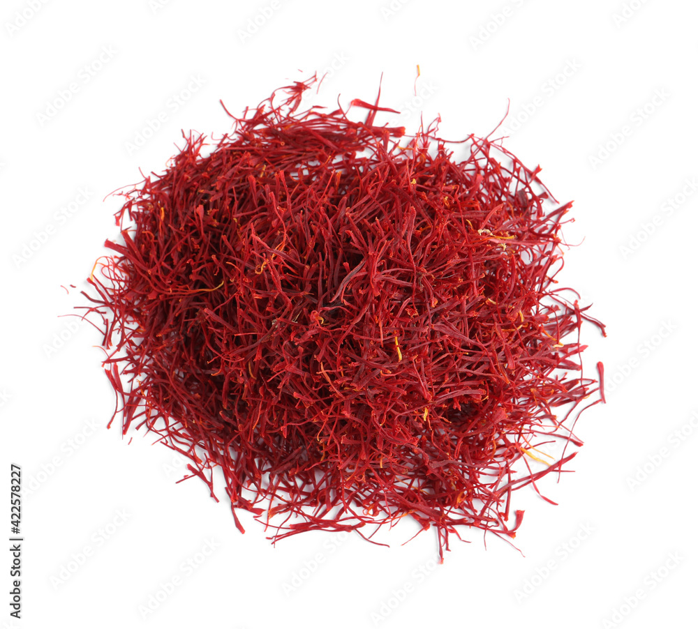 Fototapeta premium Heap of aromatic saffron on white background, top view