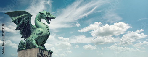 Ljubljana Dragon bridge  Zmajski most   symbol of Ljubljana  capital of Slovenia  Europe. Panoramic view on dragon and sky background..