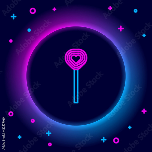 Glowing neon line Lollipop icon isolated on black background. Candy sign. Food, delicious symbol. Valentines day. Love symbol. Colorful outline concept. Vector