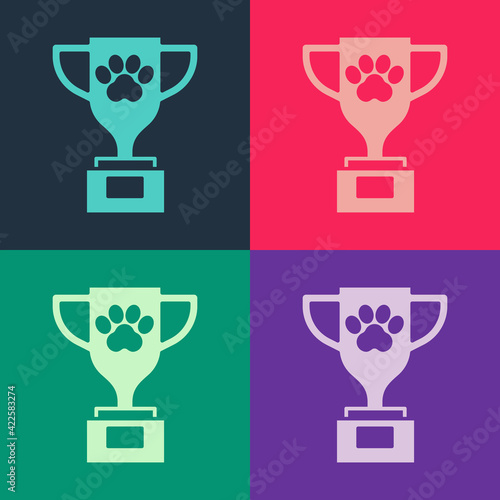 Pop art Pet award symbol icon isolated on color background. Medal with dog footprint as pets exhibition winner concept. Vector