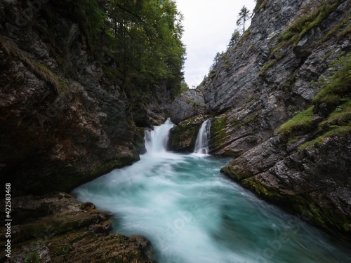 Long exposure of Stromboding waterfall canyon gorge cascade in azure blue  river Steyr Hinterstoder Upper Austria alps Stock Photo | Adobe Stock