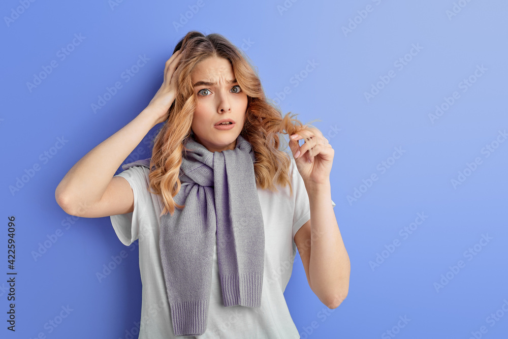 teen girl is stressed, stand with hand on head. Cute young caucasian teenager fears and upset for mistake teen girl is stressed, stand with hand on head. Cute young caucasian teenager fears and upset for mistake