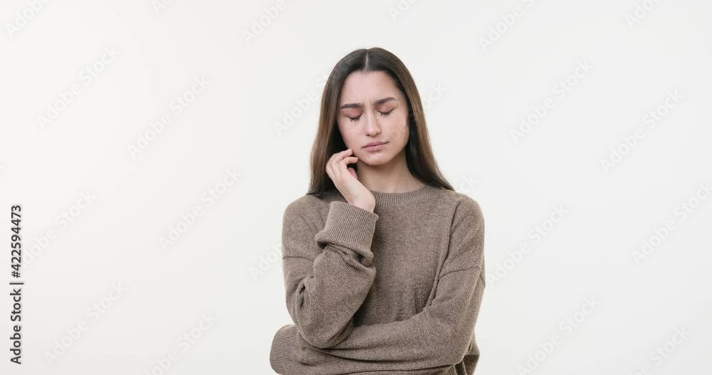 Worried and depressed woman thinking for a solution to her problem Worried and depressed woman thinking for a solution to her problem