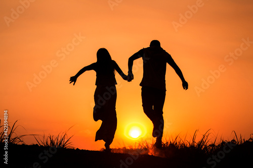 couple at sunset silhouette