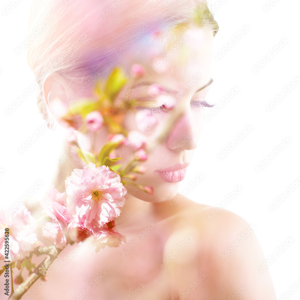 Beautiful young female face with spring blooming cherry tree flowers, double exposure. Beauty treatment, youth, springtime concept Beautiful young female face with spring blooming cherry tree flowers, double exposure. Beauty treatment, youth, springtime concept
