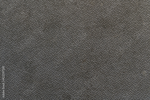 abstract background of an old grey woolen furniture upholstery