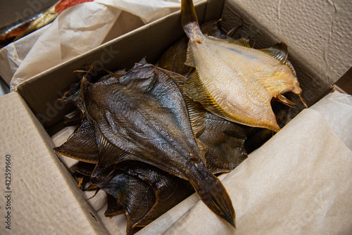 Smoked fish in craft paper ...