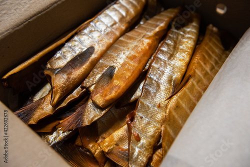 Smoked fish in craft paper ...