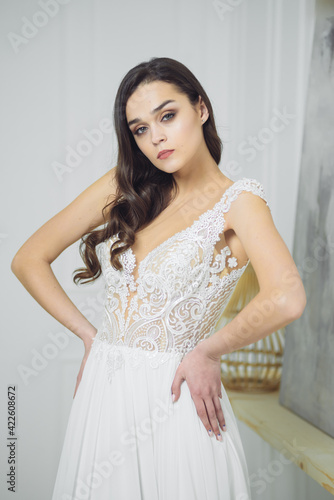 Portrait of a beautiful girl in a wedding dress