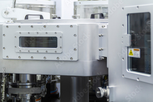 Foto Part of chamber vacuum device industrial equipment silver color of research and development laboratory high technology
