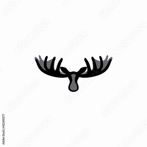 Vector illustration of a black silhouette of an elk. 
Isolated white background. moose head with horns icon
