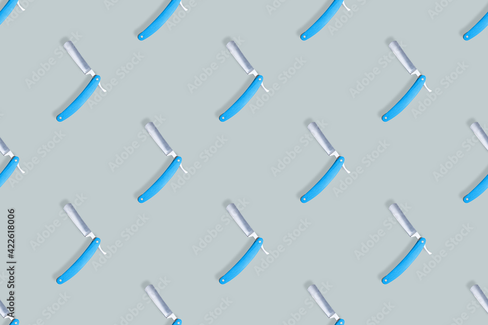 Straight razor seamless pattern. Background on the theme of a hairdressing salon. Straight razor seamless pattern. Background on the theme of a hairdressing salon.