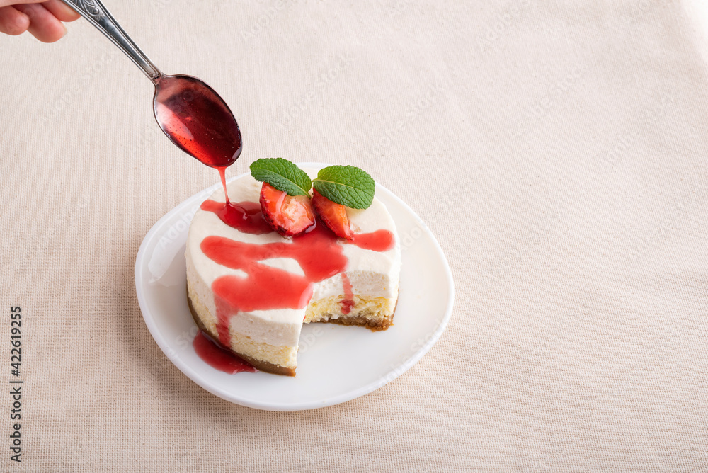 Fruit cheesecake, with fresh strawberries and berry juice. Classic dessert