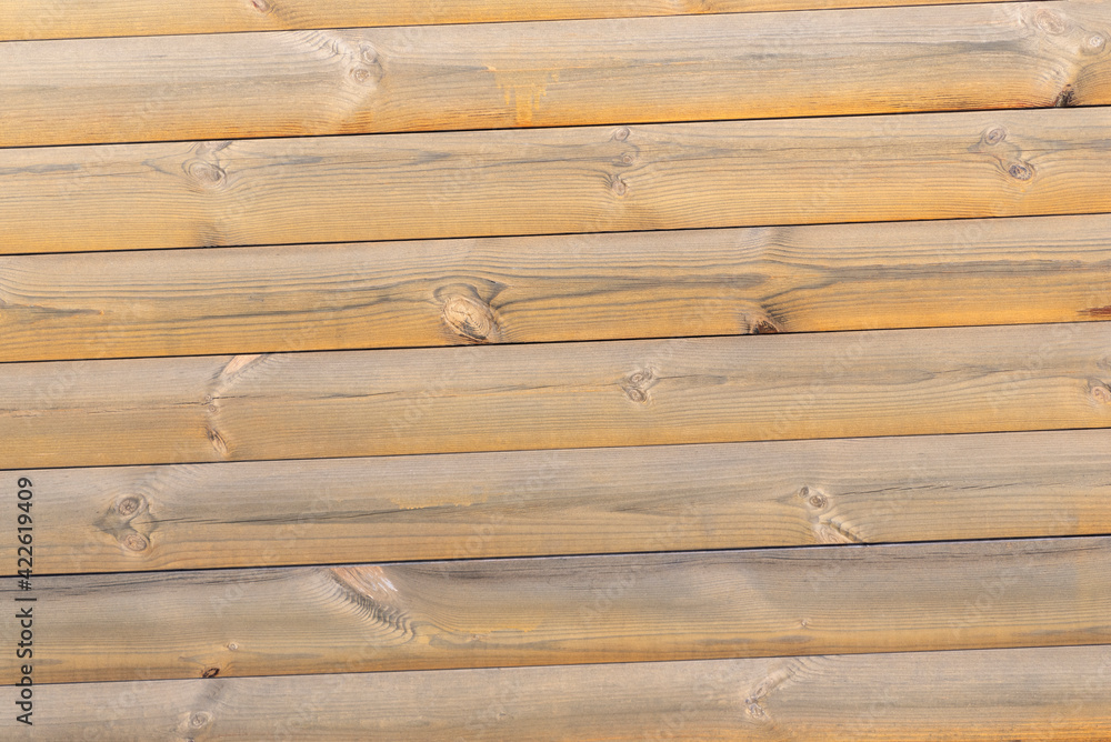 Natural wood texture. Light wooden wall from beams. Abstract background Natural wood texture. Light wooden wall from beams. Abstract background