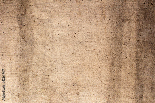 Old military tarpaulin fabric. Army faded camouflage fabric.