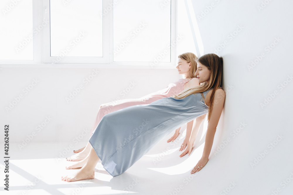 Minimalistic Fashion Portrait Of Two Girls Minimalistic Fashion Portrait Of Two Girls