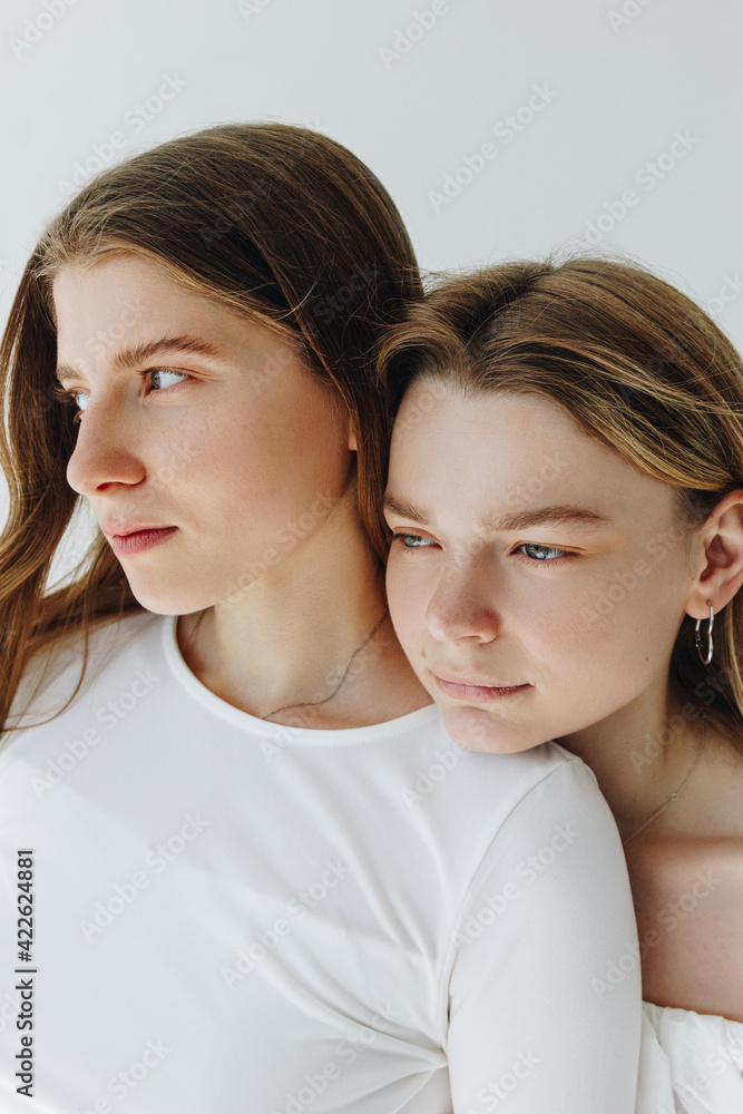 Minimalistic Fashion Portrait Of Two Girls Minimalistic Fashion Portrait Of Two Girls