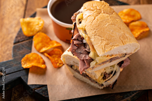 Italian beef sandwich au jus in a bowl photo