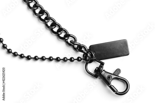 Black metal chain with carbine and tag, on a white background. Isolated object. Detail for design