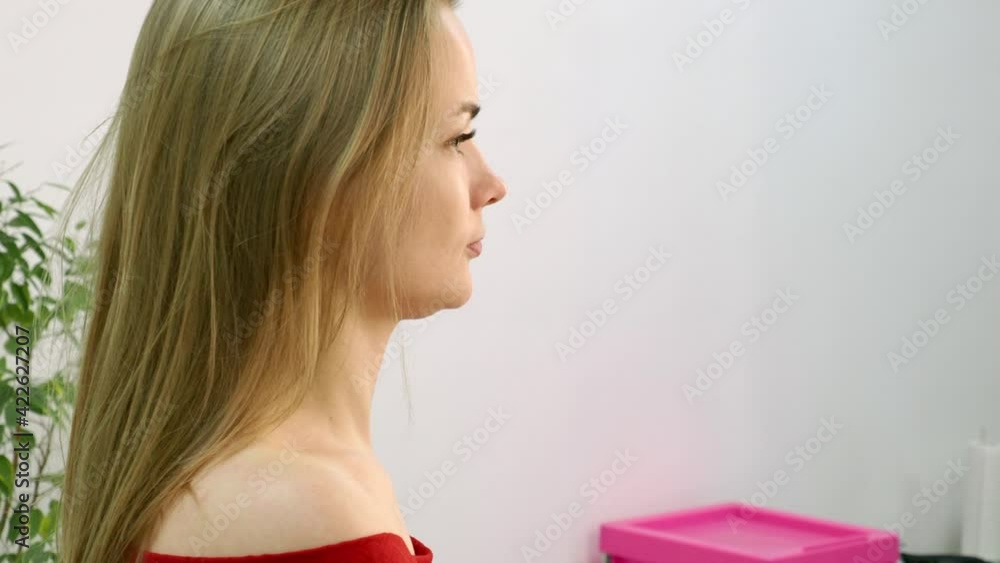 a beautiful blonde in a beauty salon a beautiful blonde in a beauty salon
