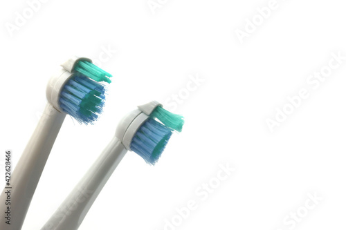 Two toothbrushes on automatic toothbrush  for brushing teeth  whitening on white background