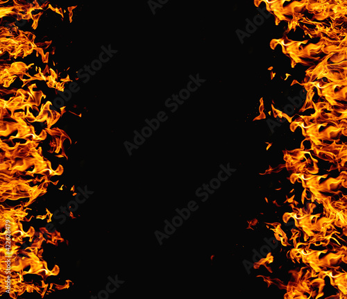 Burning background. Fire frame. Wildfire energy. Bright orange yellow flame heat design isolated on black night advertising banner with copy space for promotional text.