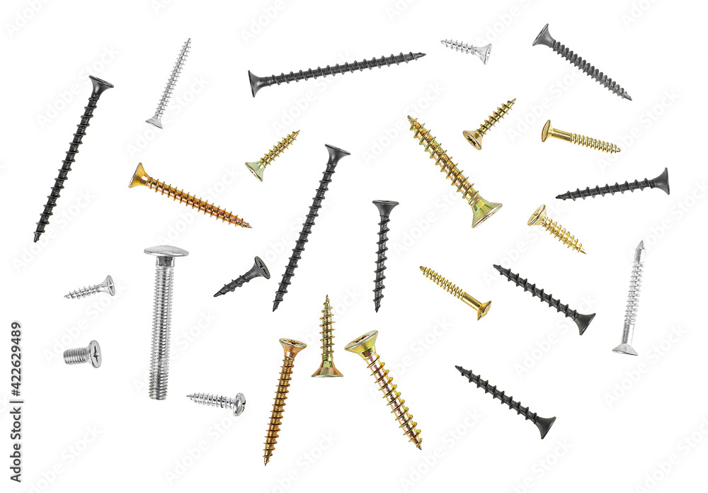 Different screws isolated on a white background, top view. Mixed screws. Different screws isolated on a white background, top view. Mixed screws.