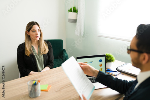 Human resources manager interviewing an attractive woman