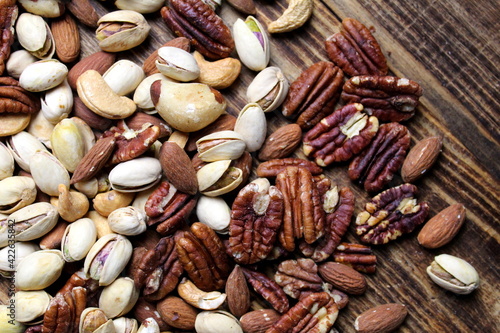 Close-ups of nuts of different varieties and types, a healthy snack.