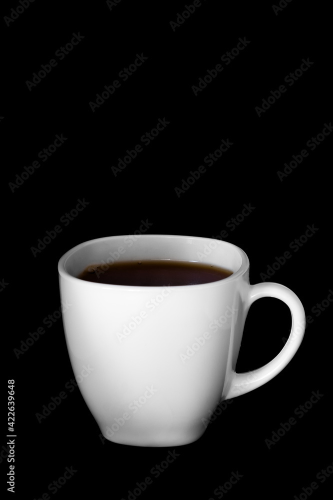 White cup of tea or coffee isolated on absolutely black background White cup of tea or coffee isolated on absolutely black background