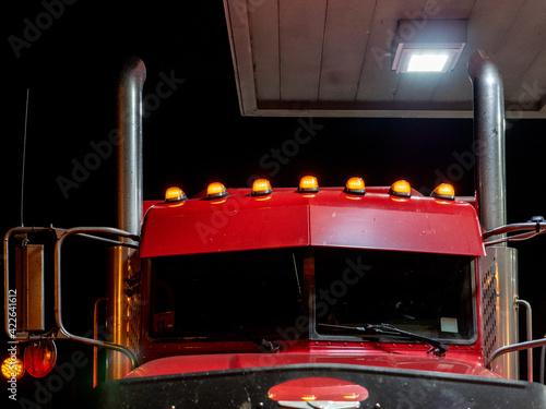 Red American Truck at the gas staion photo