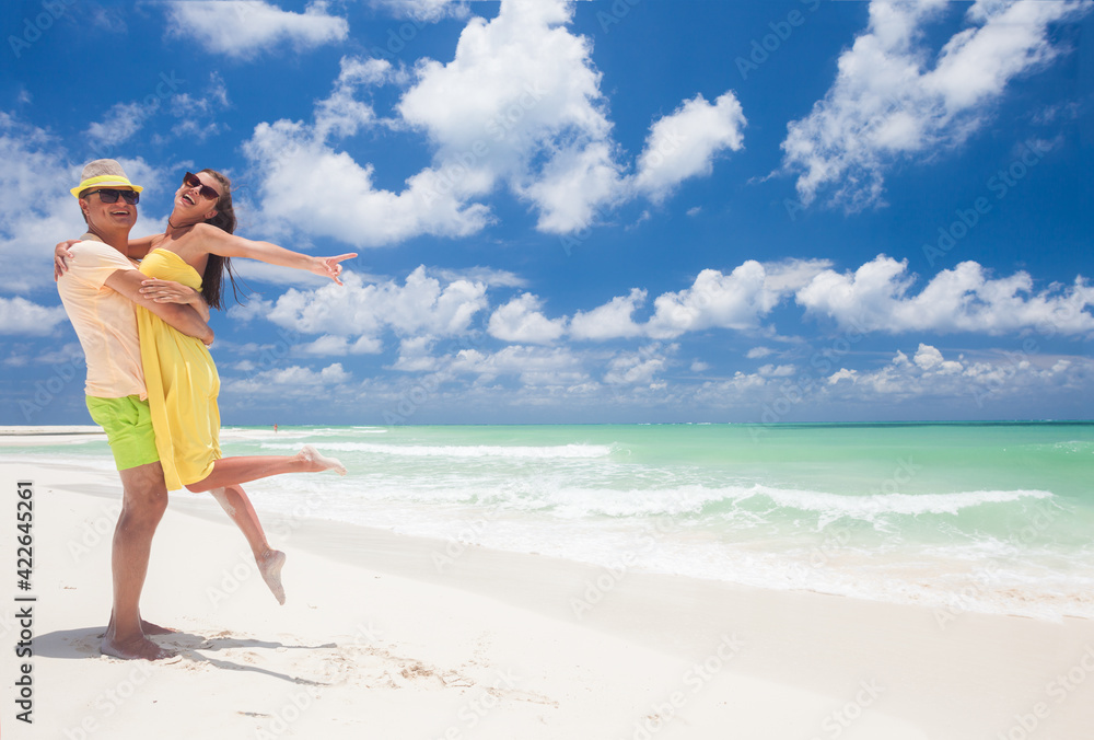 Attractive Young Couple on Tropical Beach. Cayo Largo, Cuba Attractive Young Couple on Tropical Beach. Cayo Largo, Cuba