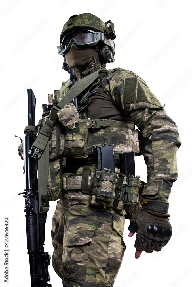 Fototapeta premium Male soldier in masking camo suit. Shot in studio. Isolated with clipping path on white background.