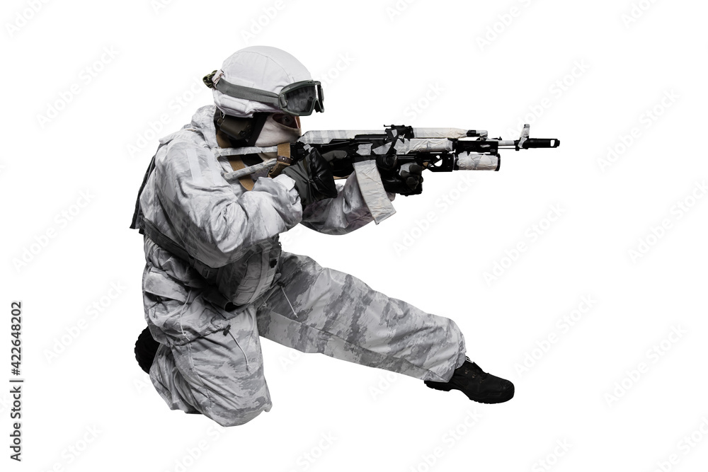 Male in soldier (snow camouflage) uniform with weapon. Shot in studio. Isolated with clipping path on white background Male in soldier (snow camouflage) uniform with weapon. Shot in studio. Isolated with clipping path on white background