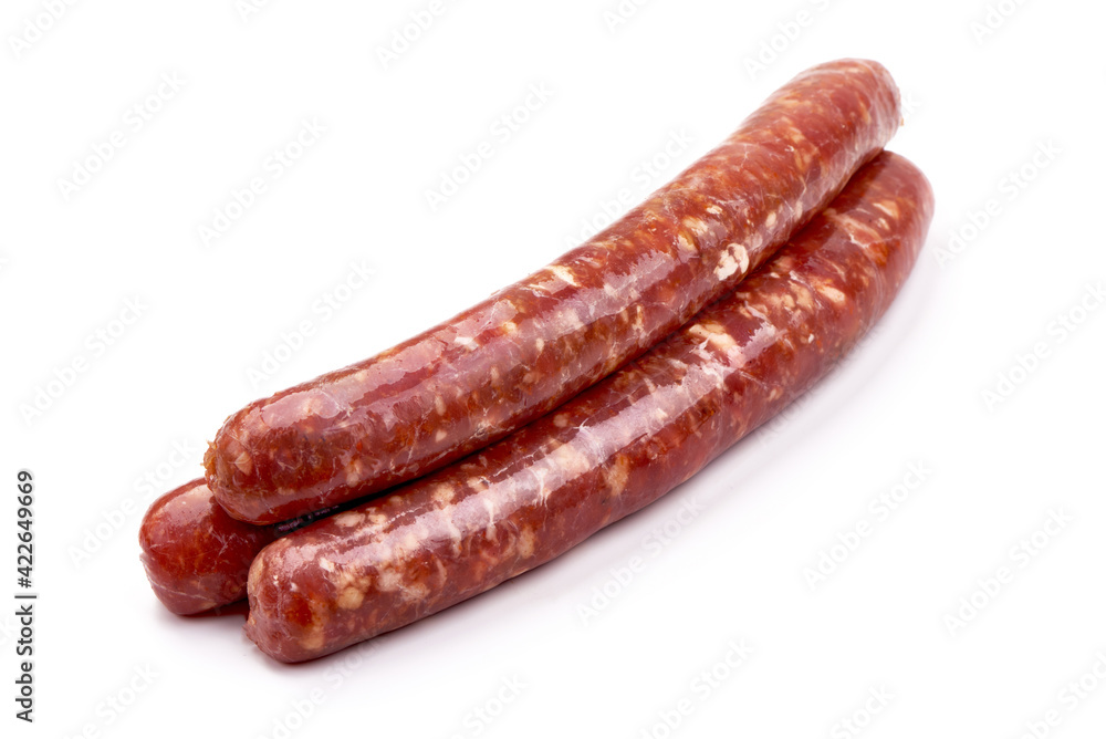 Fresh raw beef sausages, isolated on white background Fresh raw beef sausages, isolated on white background