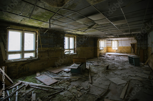 Dark abandoned industrial or office building interior