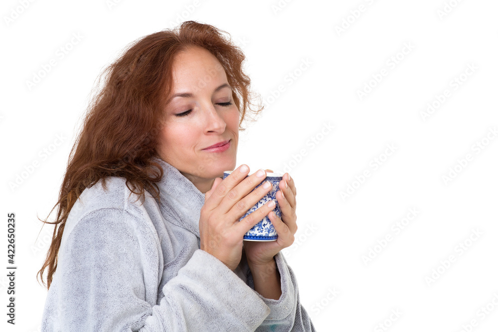 Smiling woman holding porcelain mug. Photo session in the studio Smiling woman holding porcelain mug. Photo session in the studio