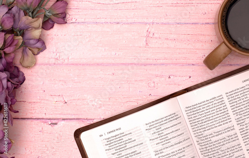 Personal Bible Study with a Cup of Coffee on a Pink Table