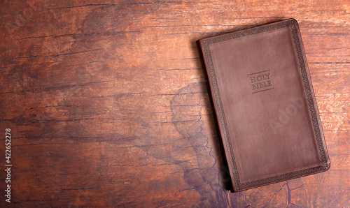 A Personal Bible Study on a Distressed Red Wood Table