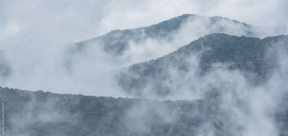 Layers of Mountains and Fog