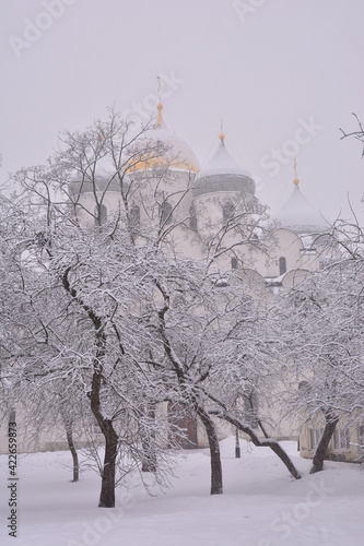 Snow Covered Winter Trees Snowfall Background Orthodox Church Veliky Novgorod, Russia .Sophia Cathedral .church in the snow