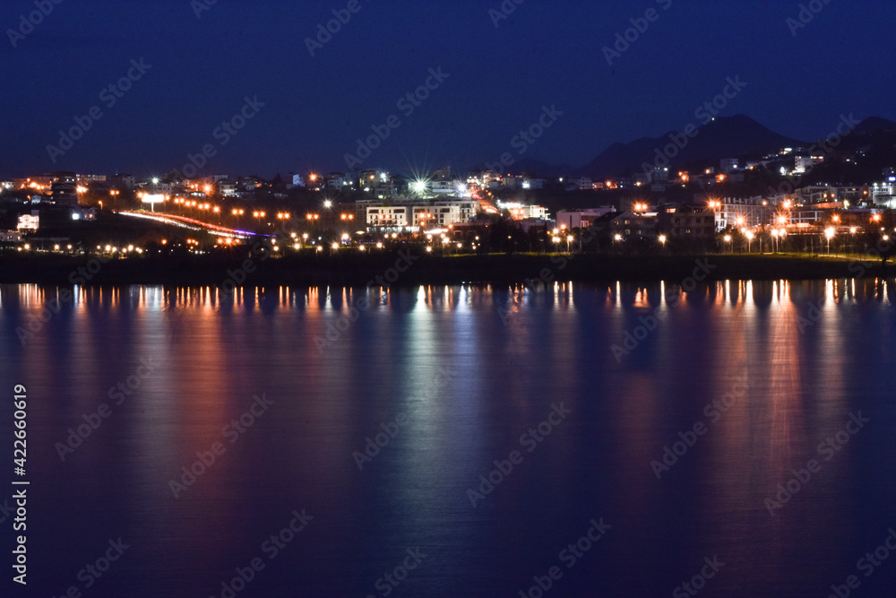 Tirana lake nightscape long exposure, copy space