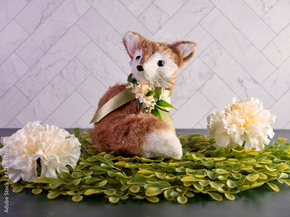 stuffed fox sitting