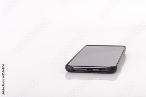 A smartphone, in white background, shoot in studio