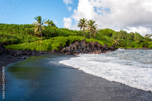 Black Sand Beach and Tropical Coastline along the Road to Hana, Maui, Hawaii