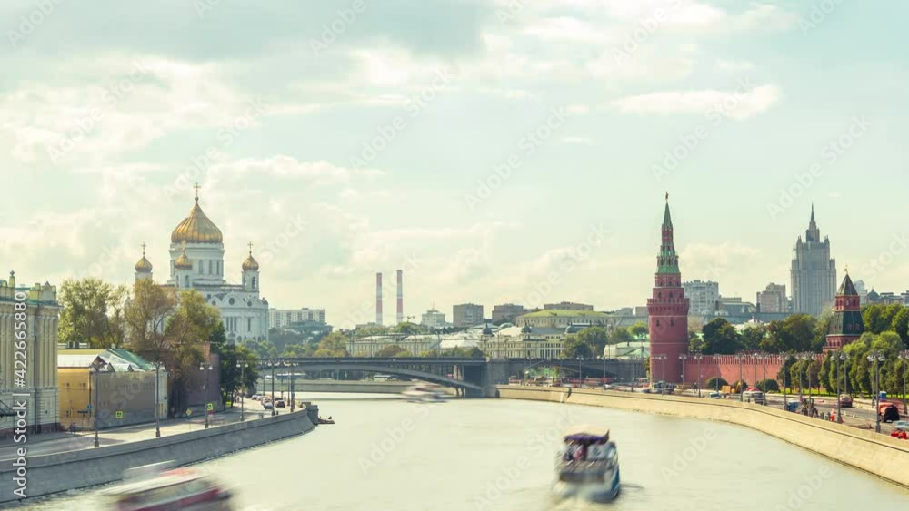 Moscow timelapse view of the moscow river and kremlin palace. Boats cruising and massive clouds around 4k timelapse panorama russia