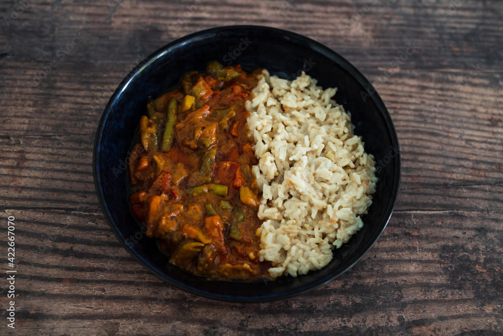 vegan stir fry with peanut sauce and coconut milk rice, healthy plant-based food vegan stir fry with peanut sauce and coconut milk rice, healthy plant-based food