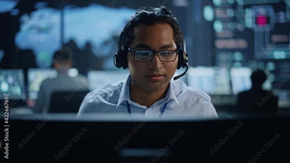 Portrait of Professional IT Technical Support Specialist Working on ...
