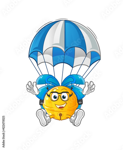 Fototapeta Naklejka Na Ścianę i Meble -  jingle bell skydiving character. cartoon mascot vector
