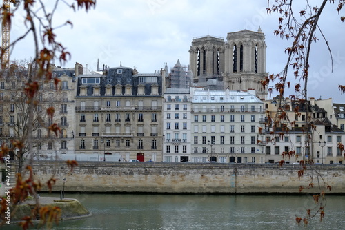 A view from the right side of Paris on the towers of Notre Dame through the Saint-Louis island. Paris, France the 13th March 2021.